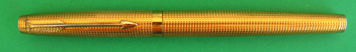 GOLD PLATED PARKER 75 WITH SAME SMALL SQUARE PATTERN AS THE STERLING CISELE. BROAD/MEDIUM NIB